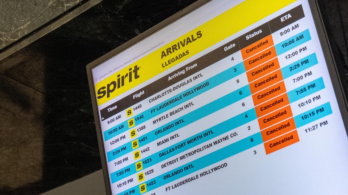 A departure board displays cancelled flights informing passengers of the airlines shutdown of Spirit Airlines at LaGuardia Airport in Queens, in New York City, U.S., May 2, 2026. REUTERS/David 'Dee' Delgado