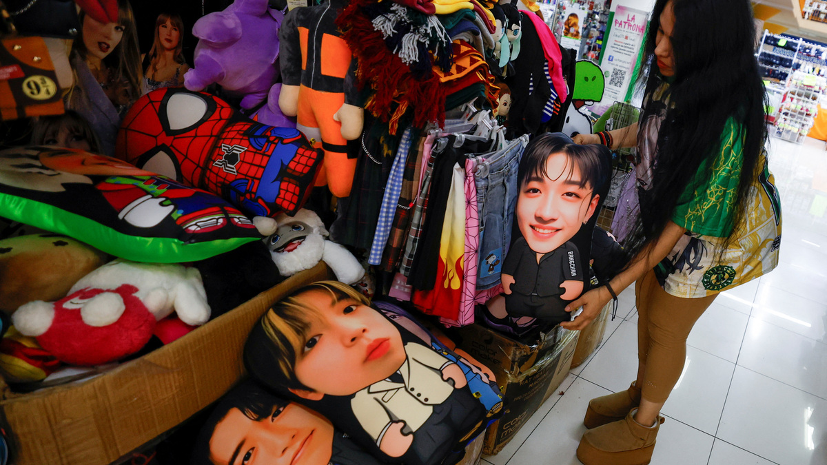 A vendor shows Korean merchandise at Plaza GaribaldI, as the bond between Korea and Mexico, one of the world’s more unusual geo-cultural connections, continues to grow, with Korean influence gaining a foothold despite distance, language barriers and a 15-hour time difference, in Monterrey, Mexico, June 17, 2026. REUTERS/Antonio Ojeda