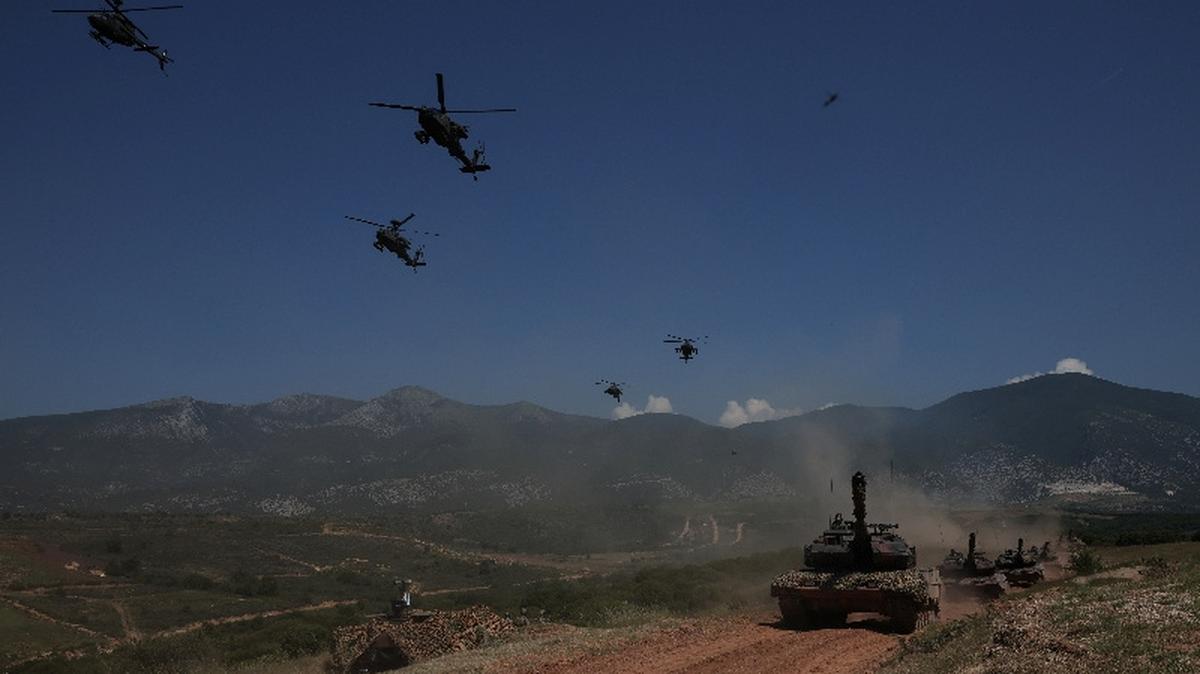 FILE PHOTO: NATO forces participate in the U.S.-led "LIVEX Immediate Response 2025" military exercise, with the participation of forces from Greece, France, Spain, Croatia, Slovakia, Bulgaria, North Macedonia and Albania, near Xanthi, Greece, June 4, 2025. REUTERS/Louisa Gouliamaki/File Photo