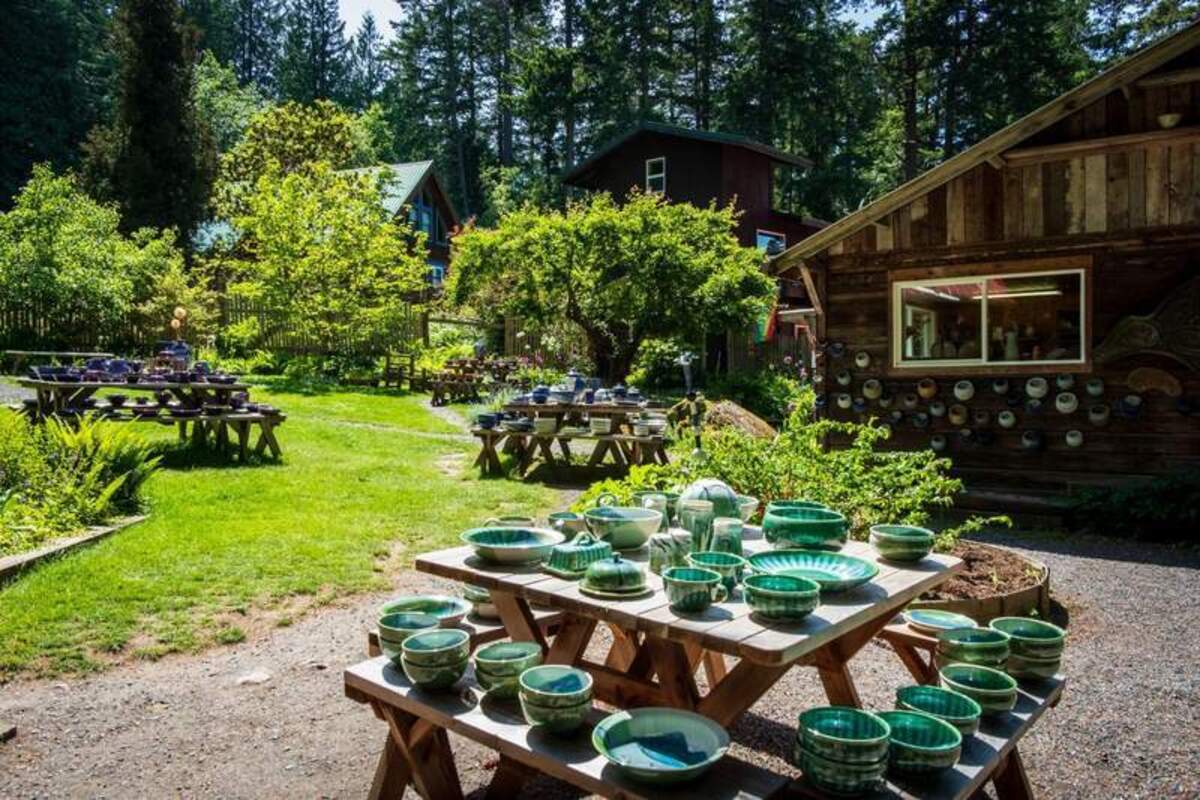  Local ceramic art pieces are beautifully showcased in nature at the historic Orcas Island Pottery studio. Photo credit: June Russell-Chamberlin 