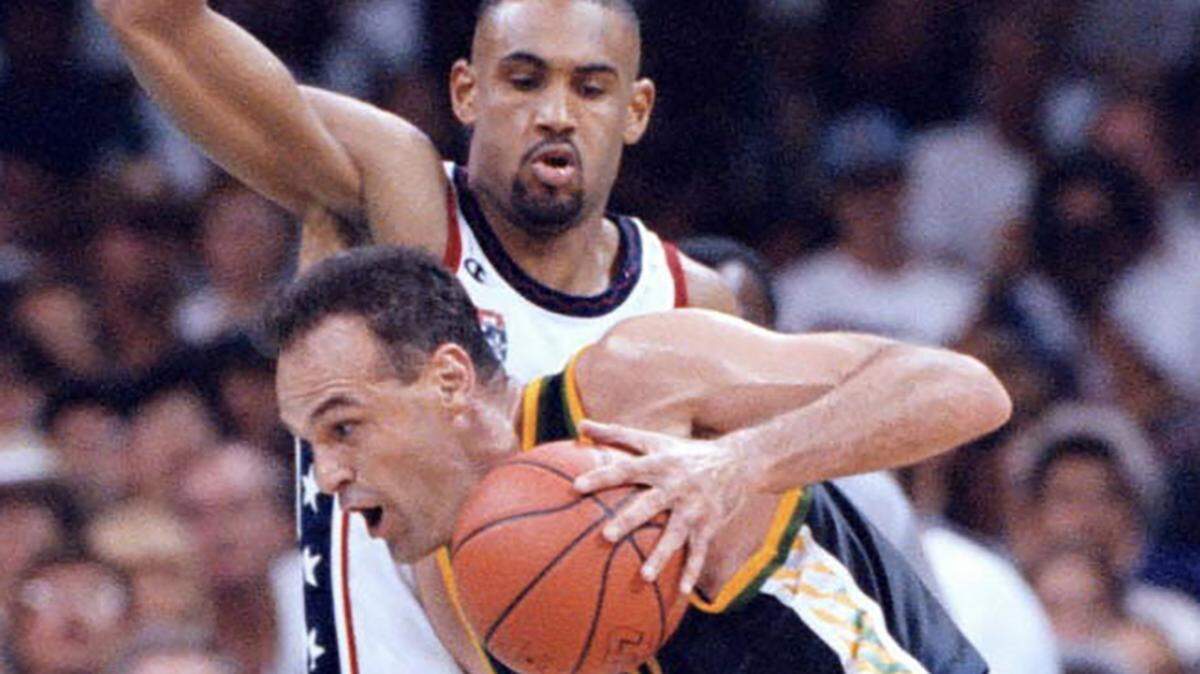 Oscar Schmidt of Brazil drives against Grant Hill of the U.S., during the 1996 Summer Olympics in Atlanta. Schmidt, who was widely regarded as the best player never to play in the NBA, died in Santana de Parnaiba, Brazil, on April 17. He was 68.