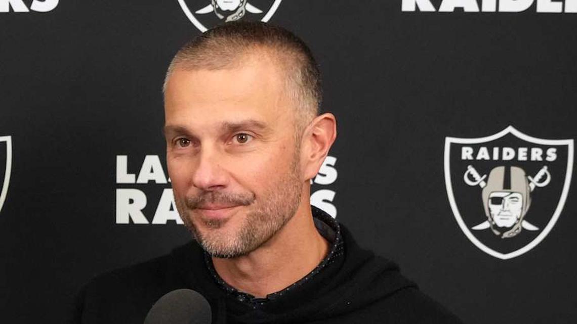  Feb 25, 2025; Indianapolis, IN, USA; Las Vegas Raiders general manager John Spytek (right) is interviewed by Raiders.com senior writer Eddie Paskal on radio row during the NFL Scouting Combine at the Indiana Convention Center. Mandatory Credit: Kirby Lee-Imagn Images | Kirby Lee-Imagn Images 