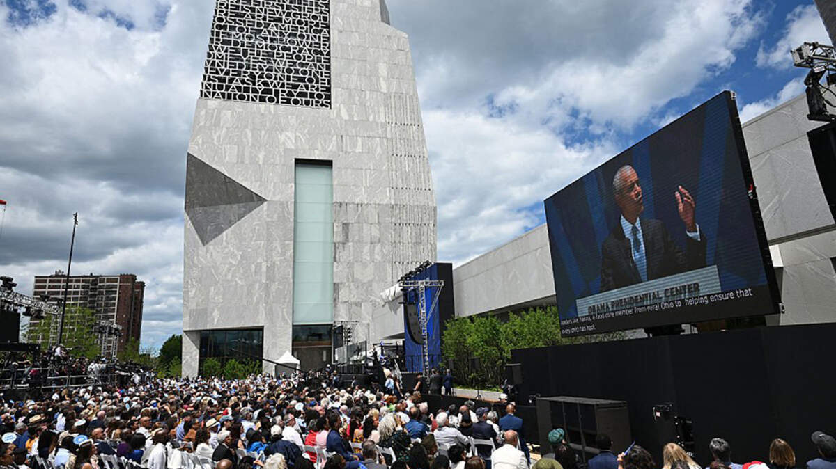 Crowds watch as former President Barack Obama speaks during the dedication ceremony for the Obama Presidential Center in Chicago on Thursday. 