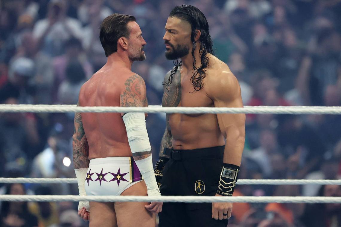  Roman Reigns and CM Punk face off during their match at WWE WrestleMania 42. Getty Images