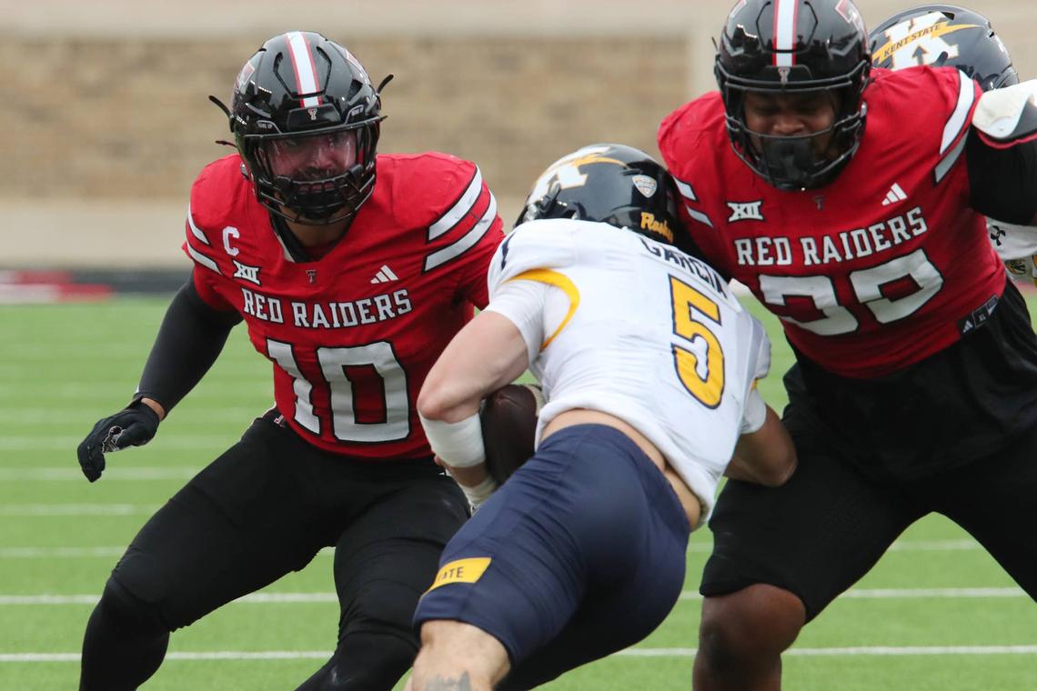  Texas Tech Red Raiders linebacker Jacob Rodriguez and defensive lineman AJ Holmes close in to tackle Kent State Golden Flashes running back Gavin Garcia in Lubbock, Texas, on Sept. 6, 2025. Michael C. Johnson-Imagn Images