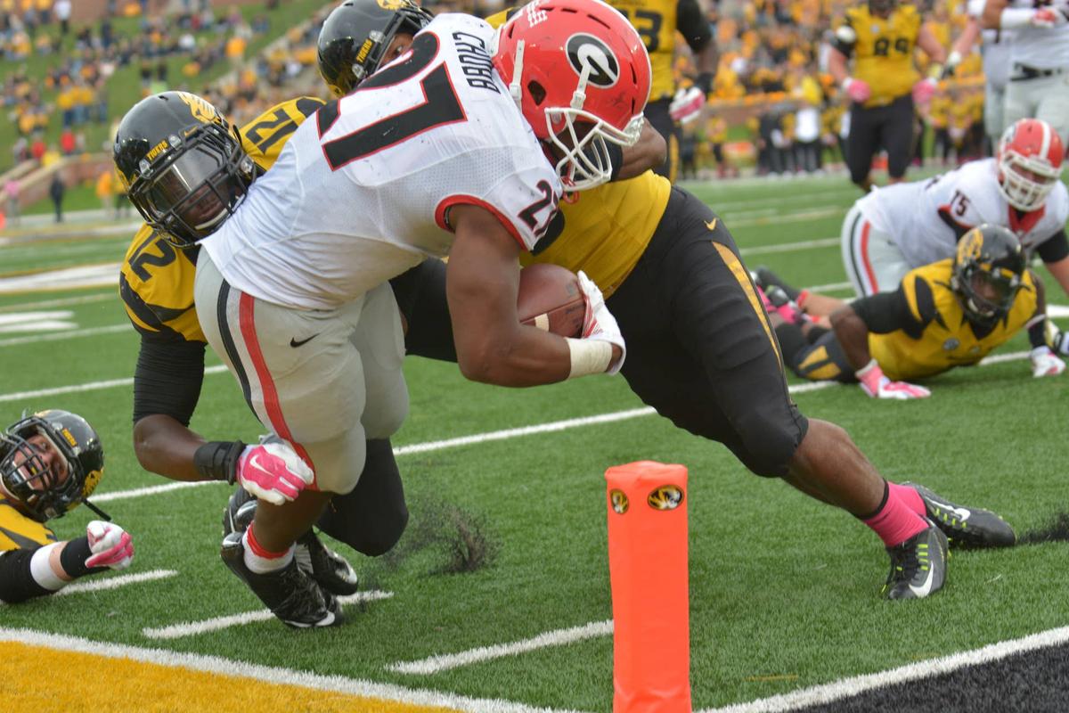  Georgia Bulldogs running back Nick Chubb scores a touchdown against the Missouri Tigers at Faurot Field. Denny Medley-USA TODAY Sports