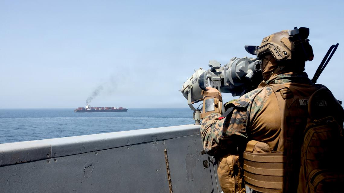 U.S. forces patrol the Arabian Sea near M/V Touska on April 20, 2026, after firing upon the Iranian-flagged vessel that the U.S. accused of attempting to violate the U.S. naval blockade of Iranian ports near the Strait of Hormuz.  (U.S. Navy/Getty Images/TNS)