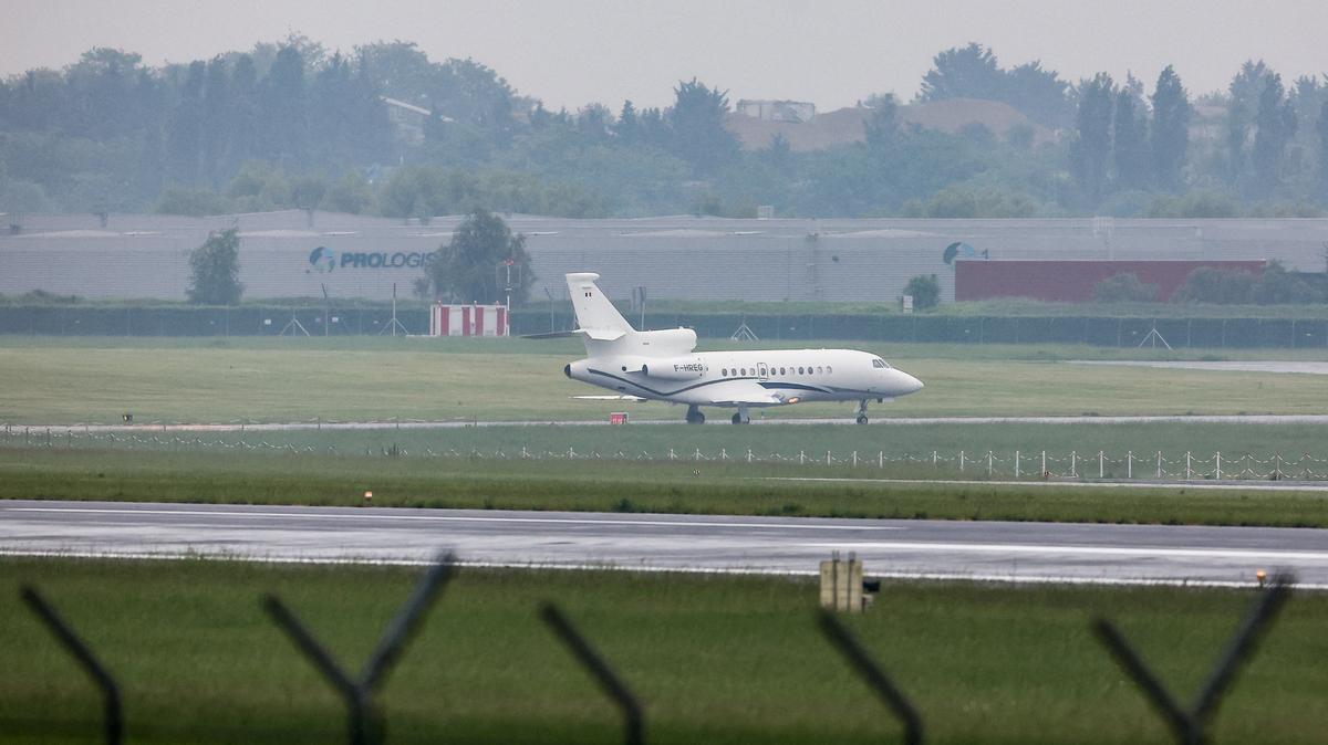 A plane carrying passengers from the cruise ship MV Hondius, which was affected by a hantavirus outbreak, arrives at Le Bourget Airport, near Paris, France, May 10, 2026. REUTERS/Abdul Saboor