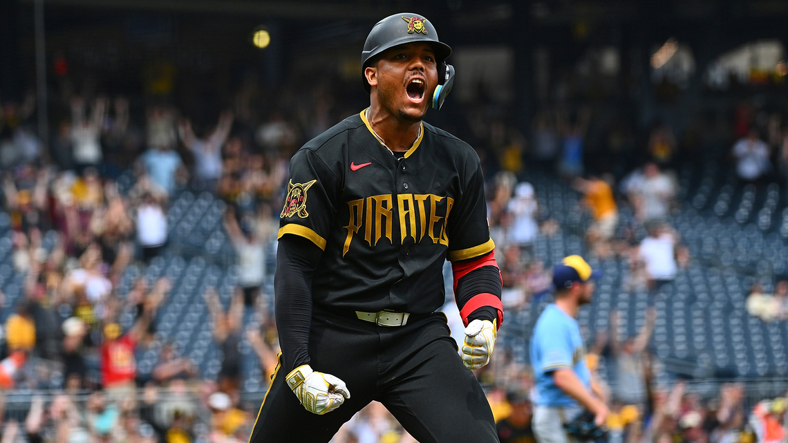 Esmerlyn Valdez's first grand slam pushes the Pirates past the Brewers in the first game of a doubleheader 