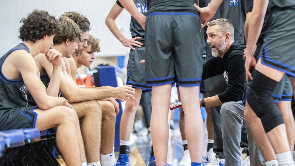 State champ coach Reggie Kohn back with basketball and family