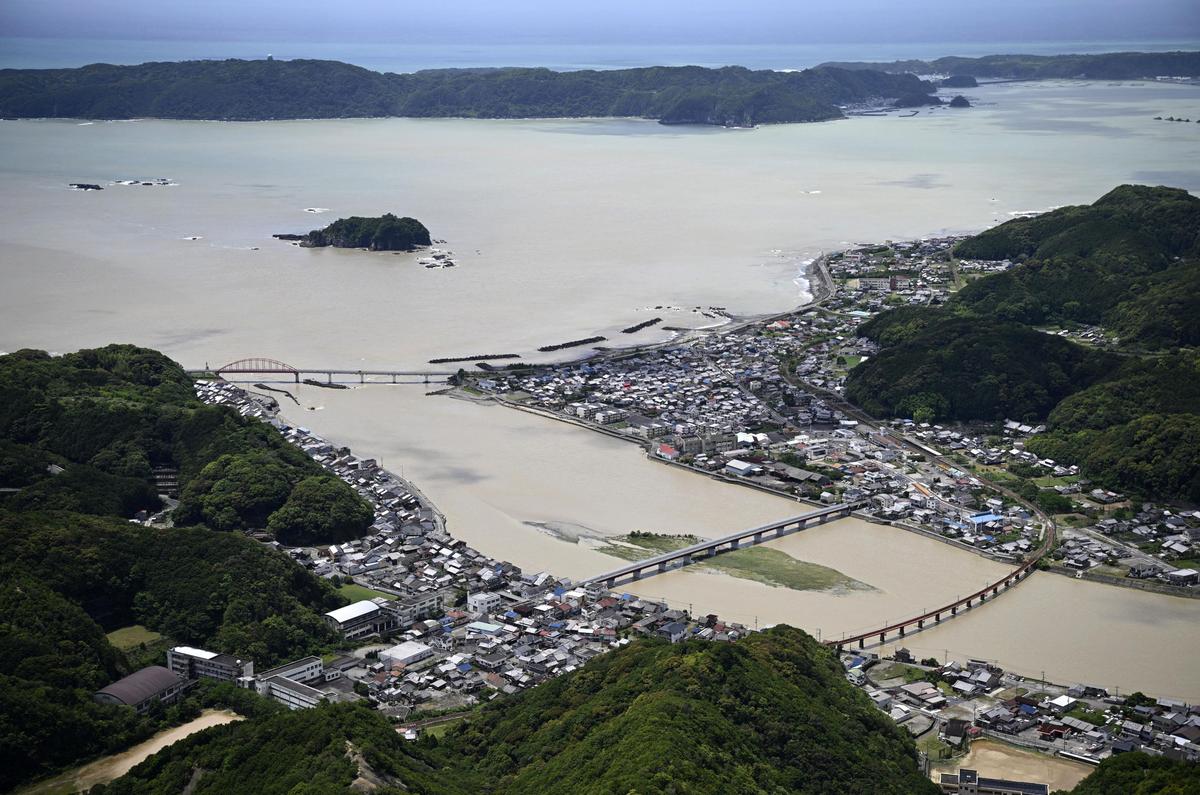 Swollen Koza River, following heavy rainfall brought by Typhoon Jangmi, in Kushimoto, Wakayama Prefecture, Japan June 3, 2026, in this photo taken by Kyodo. Mandatory credit Kyodo/via REUTERS