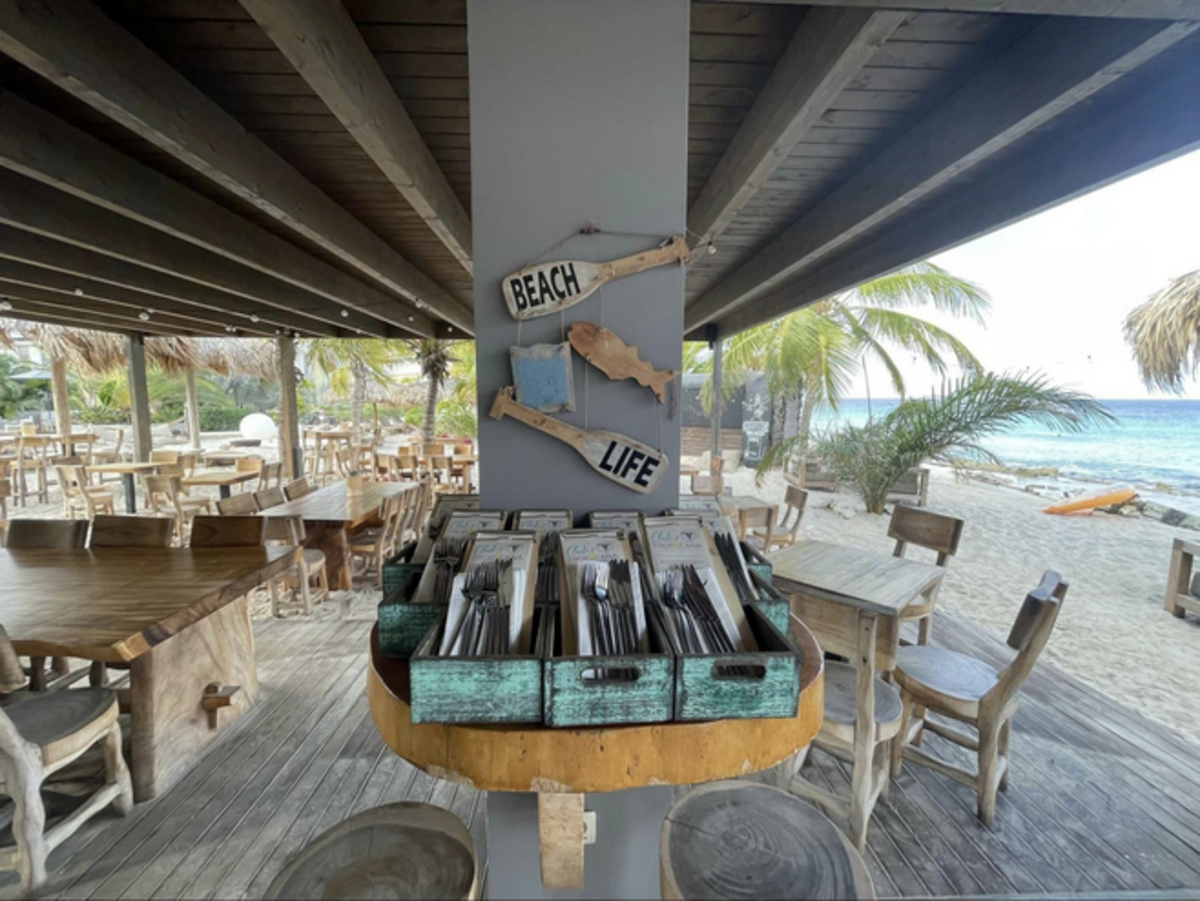 Delfin's Beach Resort has a waterfront restaurant and bar as well as loungers and direct water access. Photo credit: Jill Robbins