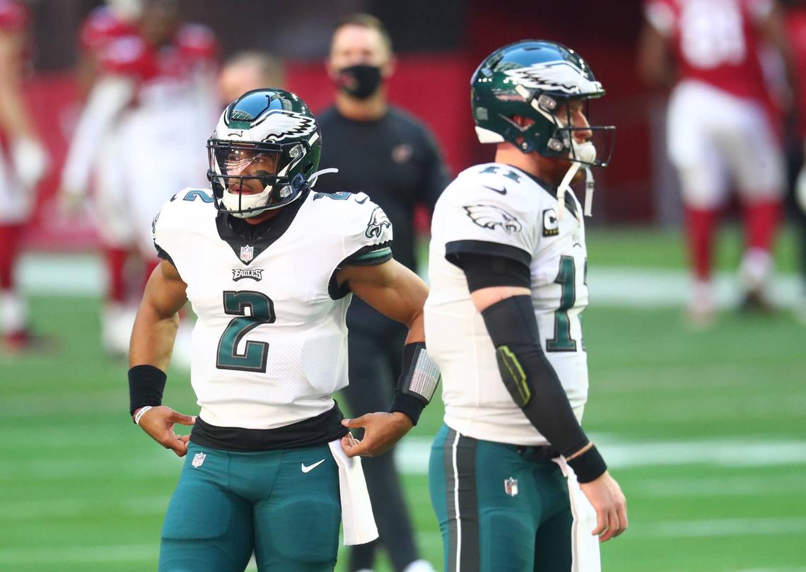  Philadelphia Eagles quarterbacks Jalen Hurts (2) and Carson Wentz (11) against the Arizona Cardinals at State Farm Stadium in 2020. (Credit: Mark J. Rebilas-USA TODAY Sports) 