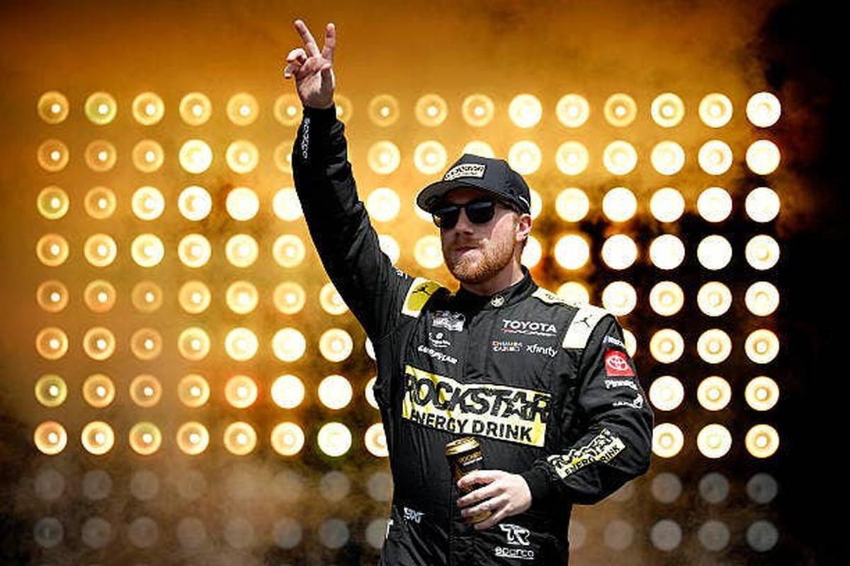  Tyler Reddick waves to fans during driver intros. (Photo by Sean Gardner/Getty Images) Photo by Sean Gardner/Getty Images