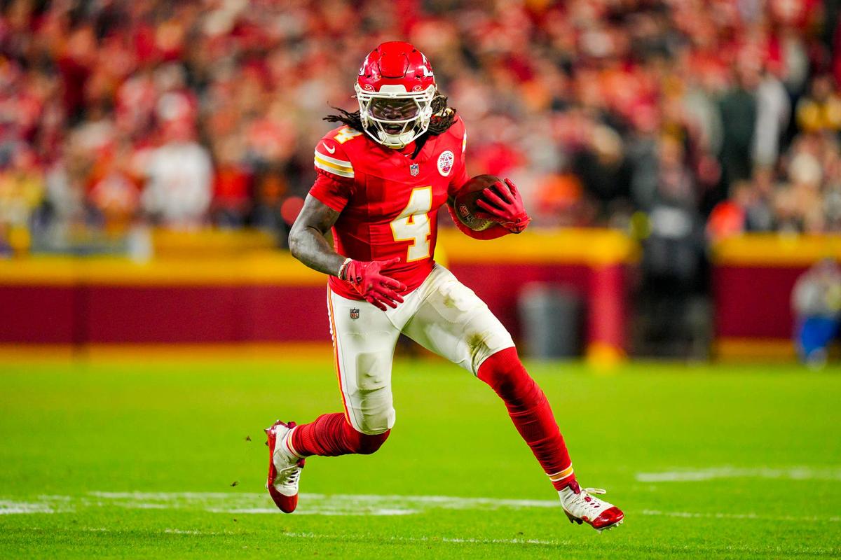  Oct 27, 2025; Kansas City, Missouri, USA; Kansas City Chiefs wide receiver Rashee Rice (4) runs with the ball during the second half against the Washington Commanders at GEHA Field at Arrowhead Stadium. Mandatory Credit: Jay Biggerstaff-Imagn Images 