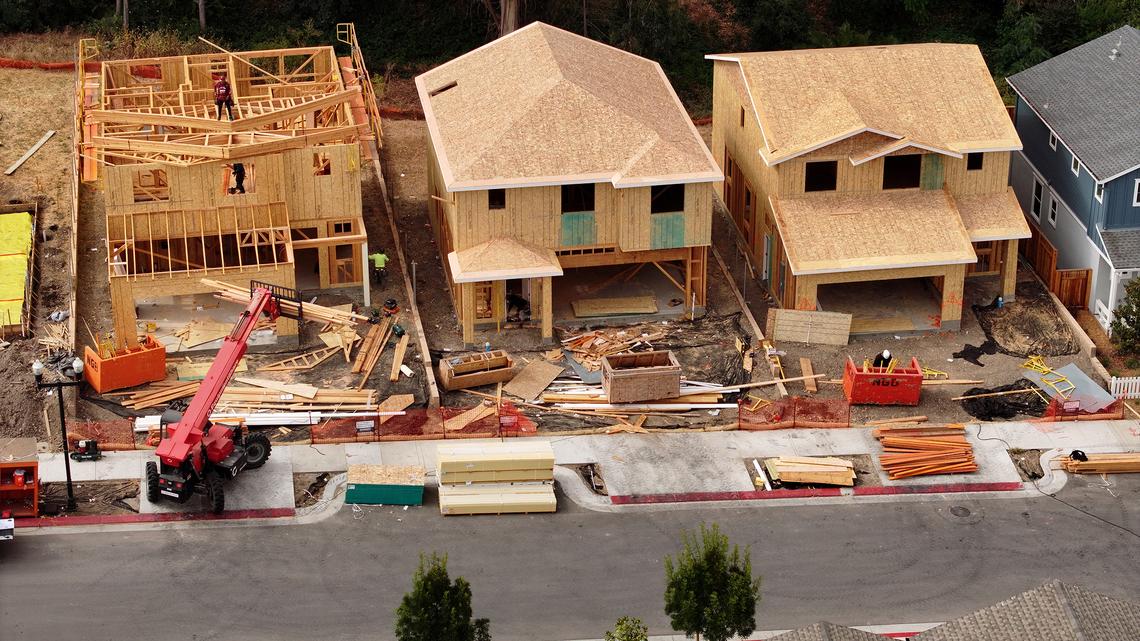 In an aerial view, construction workers build a home at a new housing development on July 1, 2025, in Hercules, California.  (Justin Sullivan/Getty Images/TNS)