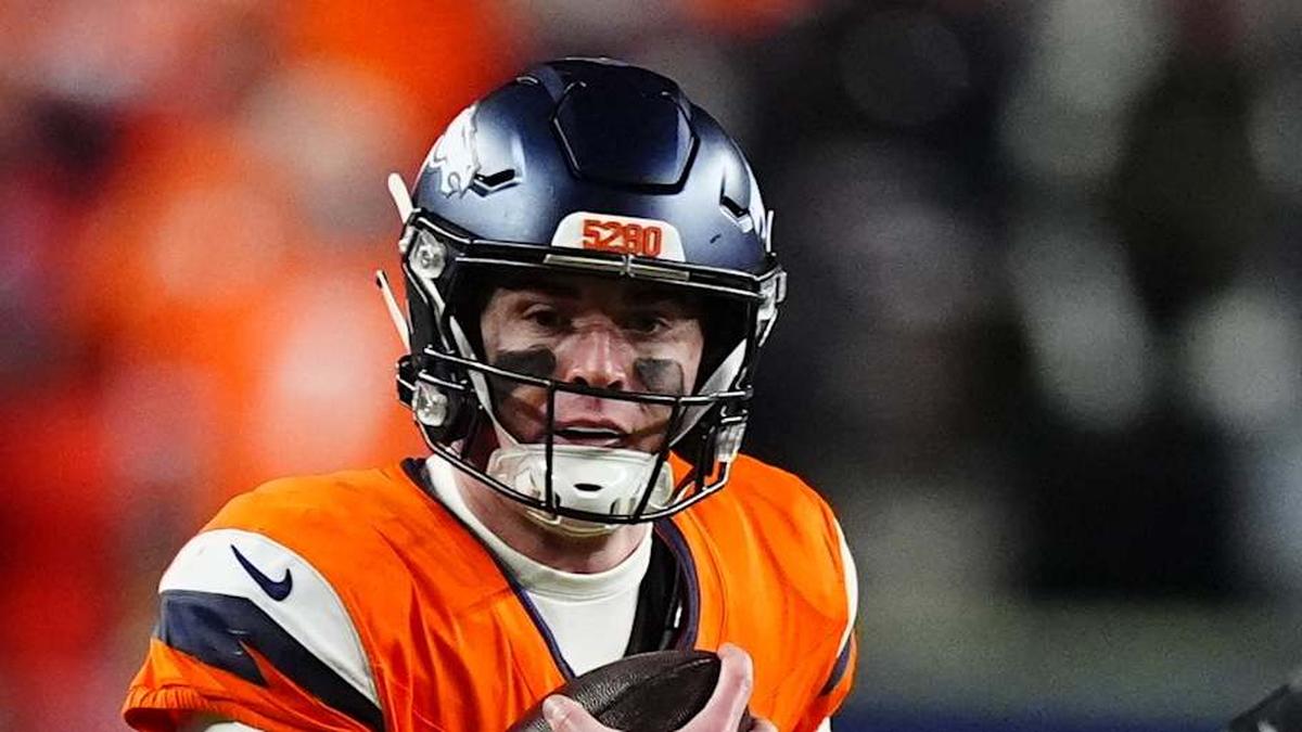  Jan 17, 2026; Denver, CO, USA; Denver Broncos quarterback Bo Nix (10) runs during the fourth quarter of an AFC Divisional Round playoff game against the Buffalo Bills at Empower Field at Mile High. Mandatory Credit: Ron Chenoy-Imagn Images | Ron Chenoy-Imagn Images 