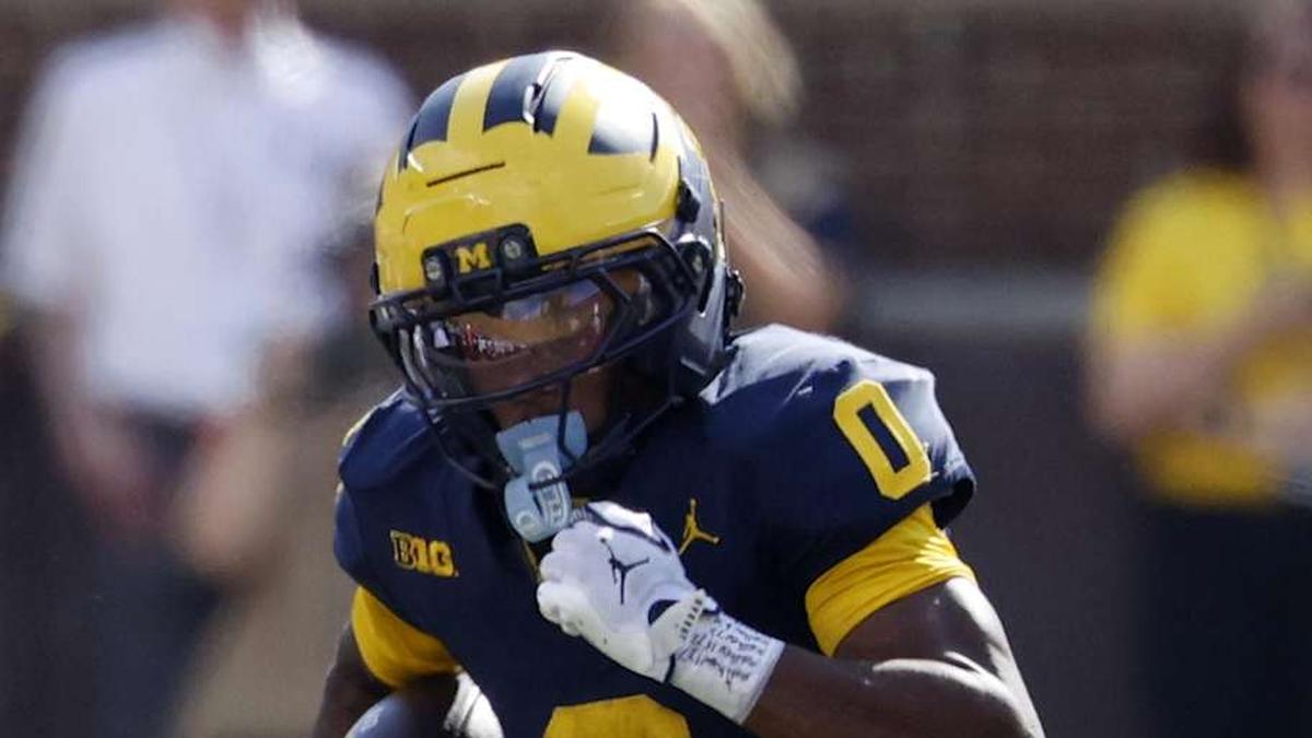  Oct 4, 2025; Ann Arbor, Michigan, USA; Michigan Wolverines wide receiver Semaj Morgan (0) runs the ball in the second half against the Wisconsin Badgers at Michigan Stadium. Mandatory Credit: Rick Osentoski-Imagn Images | Rick Osentoski-Imagn Images 