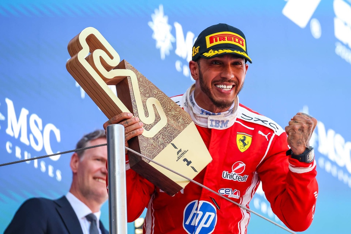  Lewis Hamilton holds his trophy in celebration on the podium during the 2026 F1 Grand Prix of Barcelona-Catalunya. Photo by Kym Illman/Getty Images