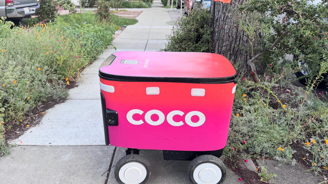 A Coco deliverybot waits outside a home in San Jose's Naglee Park neighborhood on Thursday, April 16, 2026. (Sal Pizarro/Bay Area News Group)