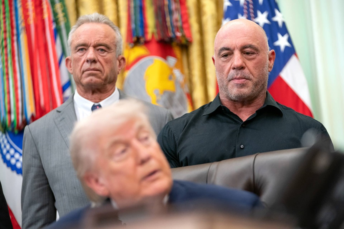  Joe Rogan (R), Robert F. Kennedy Jr. (L) look on as U.S. President Donald Trump speaks. Allison Robbert/The Washington Post-GettyImages