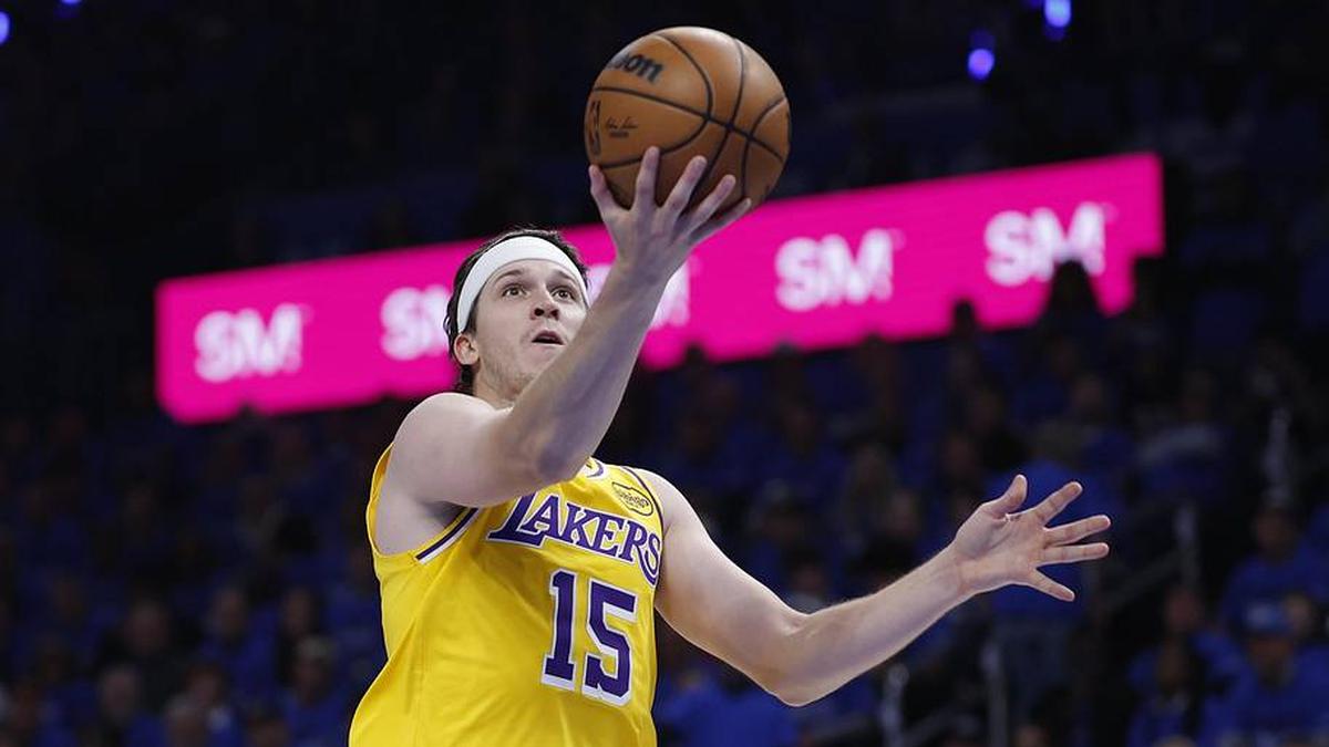  May 5, 2026; Oklahoma City, Oklahoma, USA; Los Angeles Lakers guard Austin Reaves (15) goes up for a basket beside Oklahoma City Thunder center Isaiah Hartenstein (55) in the first half during game one of the second round of the 2026 NBA Playoffs at Paycom Center. Mandatory Credit: Alonzo Adams-Imagn Images | Alonzo Adams-Imagn Images 