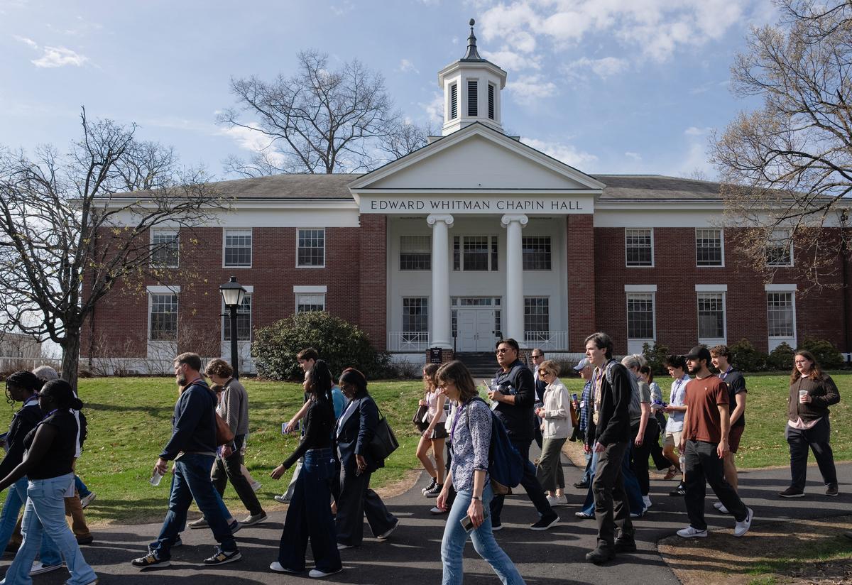  Admitted students and their families, including some from rural areas, take a tour of the Amherst College campus as they decide whether or not to enroll. Credit: Lucy Lu for The Hechinger Report