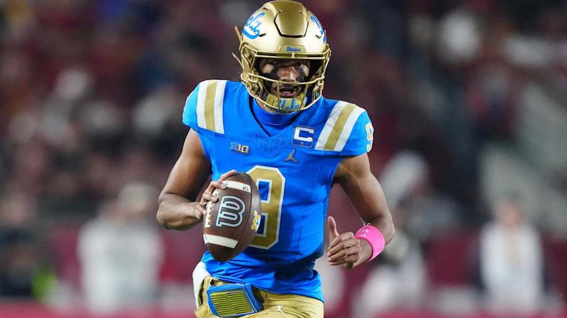  Nov 29, 2025; Los Angeles, California, USA; UCLA Bruins quarterback Nico Iamaleava (9) carries the ball against the Southern California Trojans in the first half at United Airlines Field at Los Angeles Memorial Coliseum. Mandatory Credit: Kirby Lee-Imagn Images | Kirby Lee-Imagn Images 
