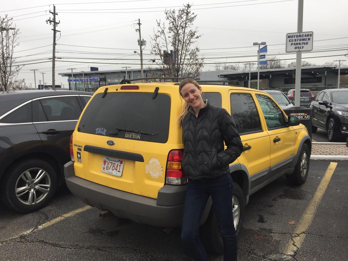  Sarah Barbo with her Ford Escape and the Bronze Star license plate in 2016. (Photo courtesy of the author) 