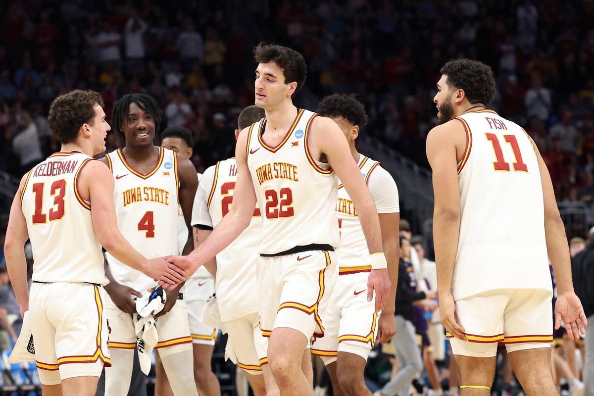  MILWAUKEE, WISCONSIN - MARCH 21: Milan Momcilovic #22 of the Iowa State Cyclones reacts with Cade Kelderman #13 and Kayden Fish #11 during the first half against the Lipscomb Bisons in the first round of the NCAA Men's Basketball Tournament at Fiserv Forum on March 21, 2025 in Milwaukee, Wisconsin. (Photo by Stacy Revere/Getty Images) 
