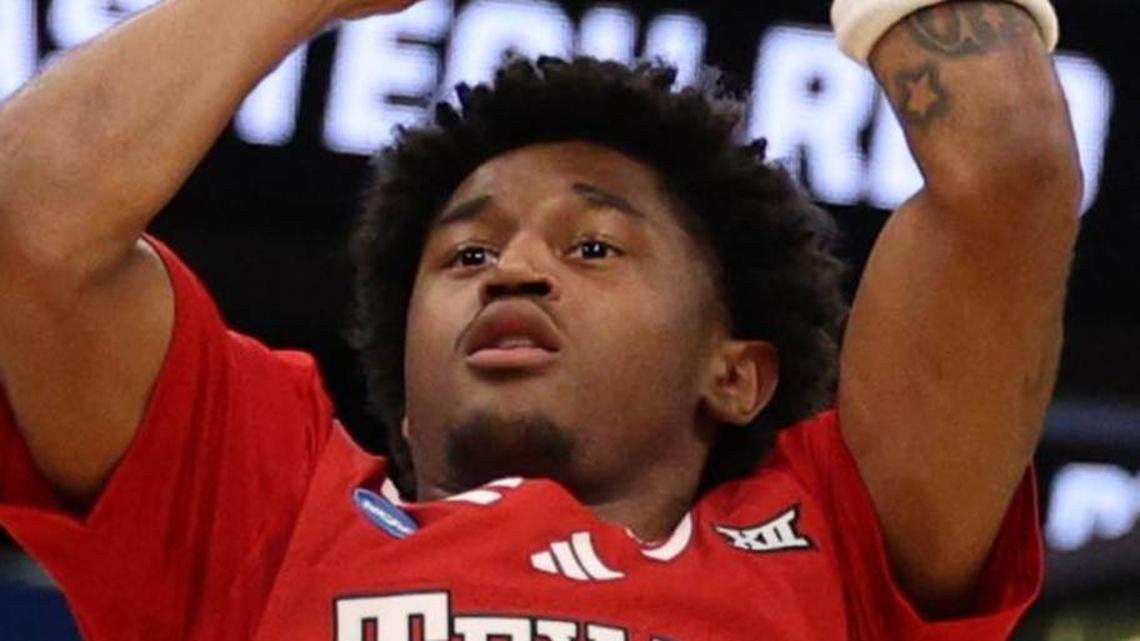  Mar 22, 2026; Tampa, FL, USA; Texas Tech Red Raiders guard Jaylen Petty (11) shoots over Alabama Crimson Tide guard Labaron Philon (0) in the first half during a second round game of the men's 2026 NCAA Tournament at Benchmark International Arena. Mandatory Credit: Nathan Ray Seebeck-Imagn Images | Nathan Ray Seebeck-Imagn Images 