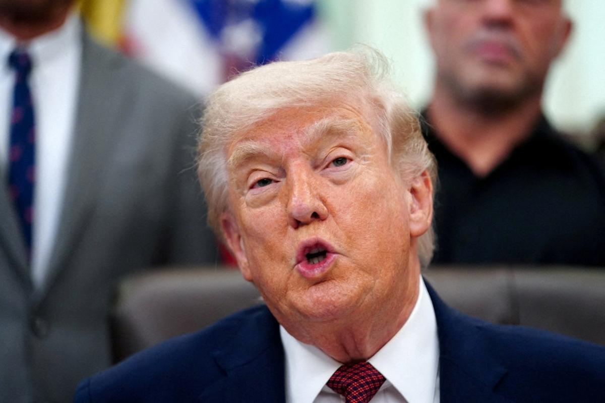 FILE PHOTO: U.S. President Donald Trump speaks about research into mental health treatments in the Oval Office of the White House in Washington, D.C., April 18, 2026. REUTERS/Nathan Howard/File Photo