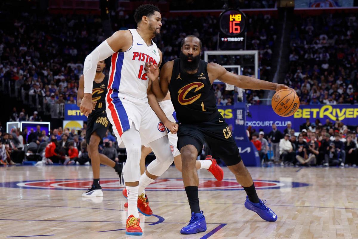  Cleveland Cavaliers guard James Harden (1) dribbles defended by Detroit Pistons forward Tobias Harris (12) in the first half during game two of the second round of the 2026 NBA Playoffs. 