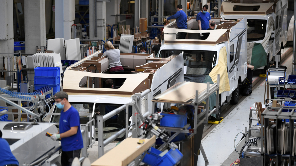 Workers assemble campers at Knaus-Tabbert AG factory in Jandelsbrunn near Passau, Germany, March 16, 2021. Picture taken March 16, 2021. REUTERS/Andreas Gebert
