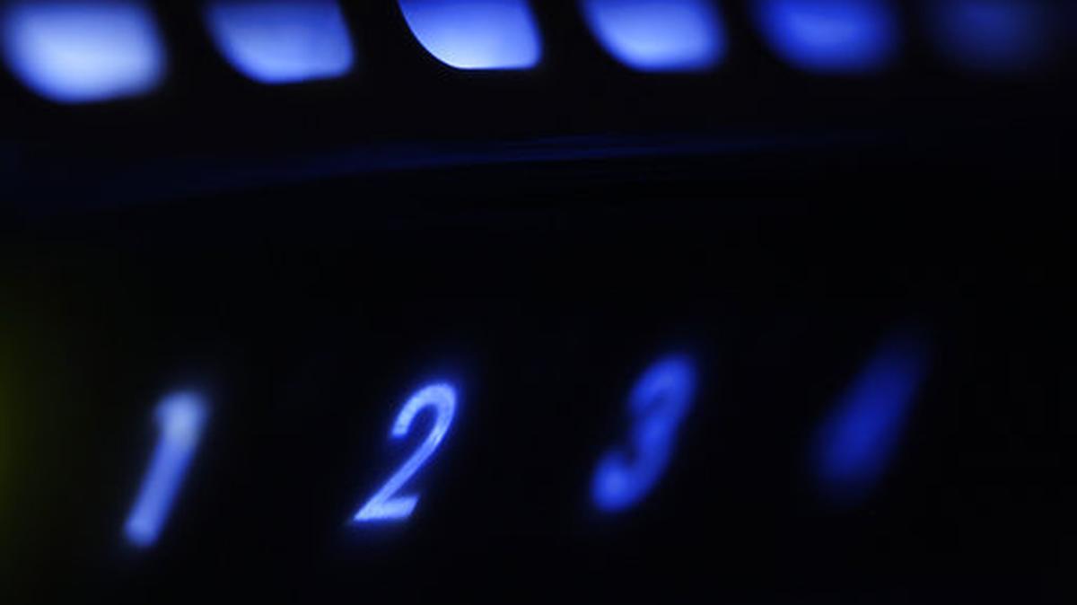 FILE - This Sunday, July 27, 2008, file photo shows an LED-illuminated wireless router in Philadelphia. On Monday, April 16, 2018, Washington and London jointly accused Russia’s government of targeting internet equipment in the U.S. and U.K. for political and economic espionage. The two governments said the operations, which allegedly involve planting malware on internet routers and other equipment, could also lay the foundation for future offensive cyberattacks.