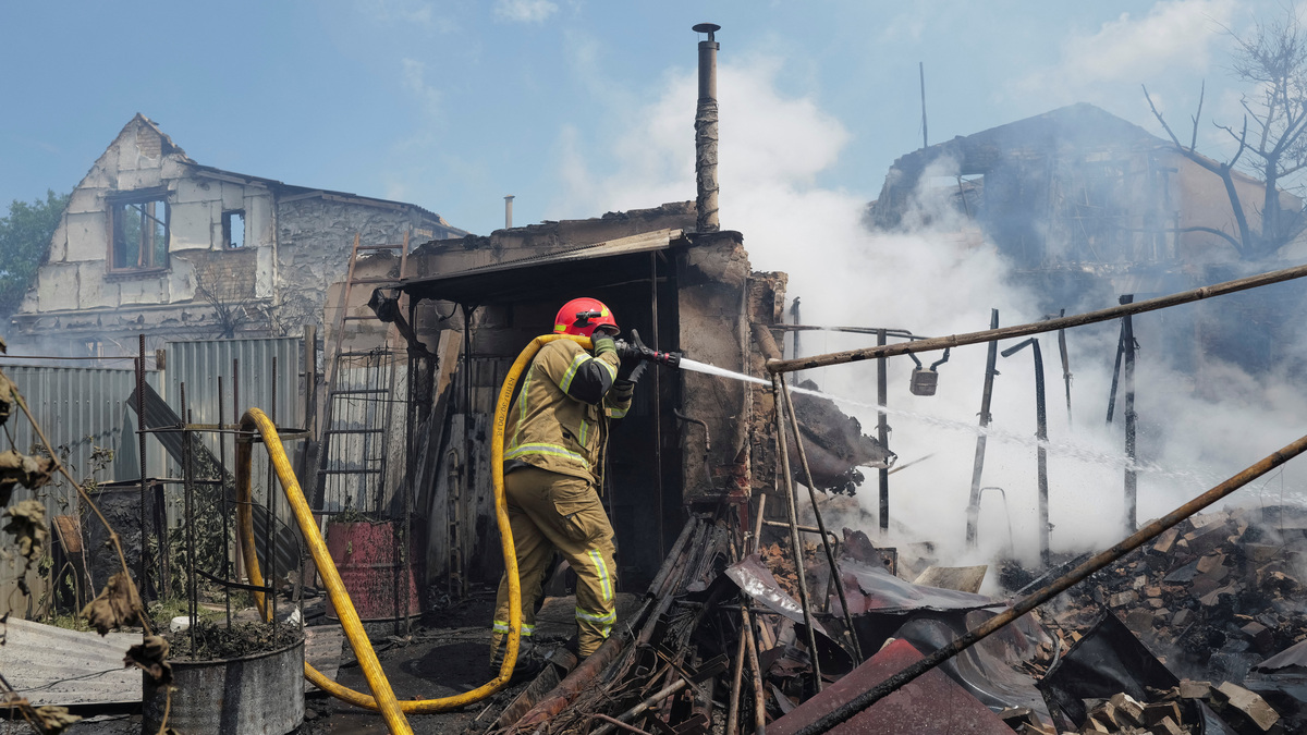 A firefighter works at a site of a Russian missile and drone strikes, amid Russia’s attack on Ukraine, on the outskirts of Kyiv, Ukraine July 6, 2026. REUTERS/Viacheslav Ratynskyi