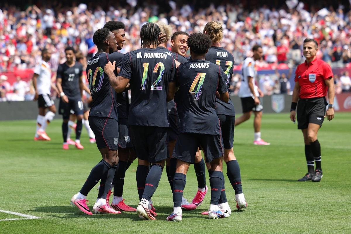  Antonee Robinson of United States celebrates with teammates after scoring his team's first goal during the international friendly match between United States and Germany at Soldier Field on June 06, 2026 in Chicago, Illinois. (Photo by John Dorton/USSF/Getty Images) Photo by John Dorton/USSF/Getty Images