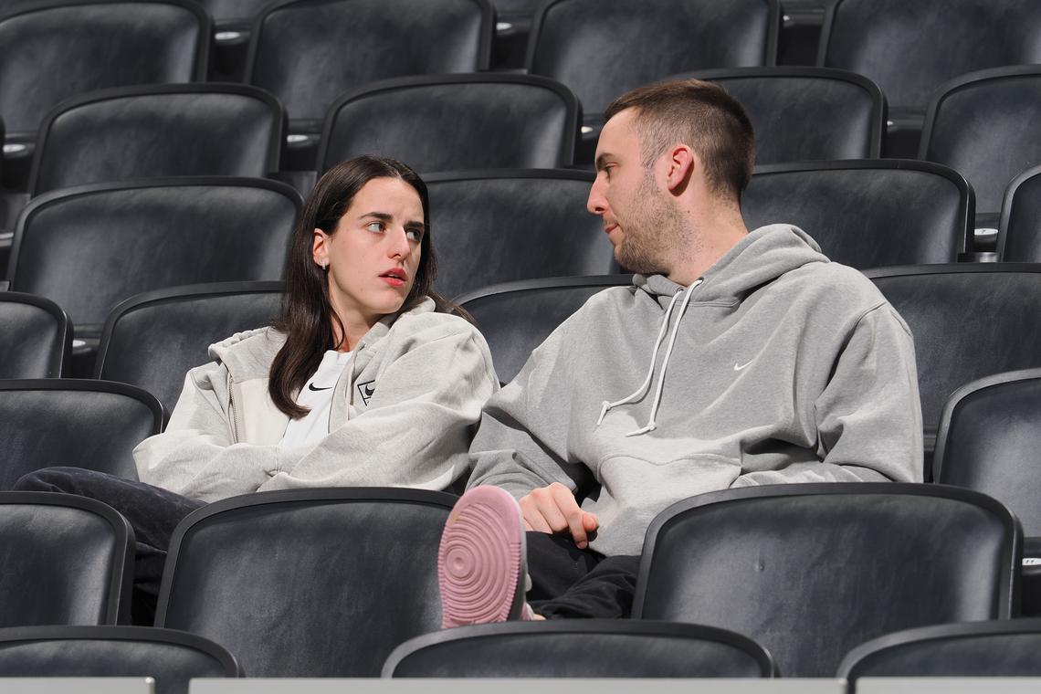  INDIANAPOLIS, IN - DECEMBER 27: Caitlin Clark and Connor McCaffery take in the Salt Lake City Stars take on the Indiana Mad Ants on November 15, 2024 at Gainbridge Fieldhouse in Indianapolis, Indiana. (Photo by Ron Hoskins/NBAE via Getty Images) 