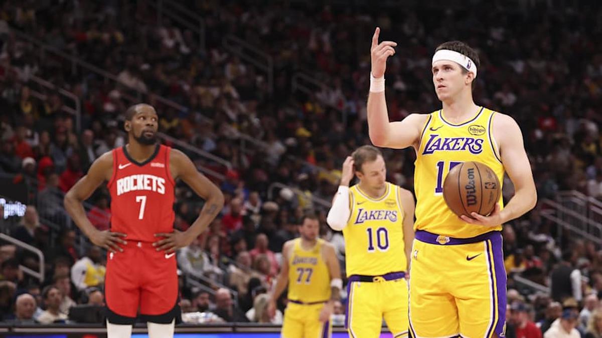  Austin Reaves and Kevin Durant | Troy Taormina-Imagn Images 