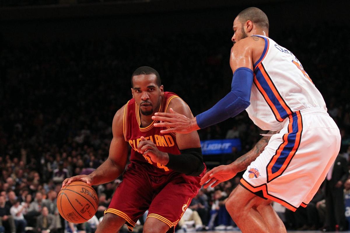 Mar 31, 2012; New York, NY, USA; Cleveland Cavaliers power forward Samardo Samuels (24) attempts to drive past New York Knicks center Tyson Chandler (6) during the first quarter at Madison Square Garden. Mandatory Credit: Anthony Gruppuso-USA TODAY Sports