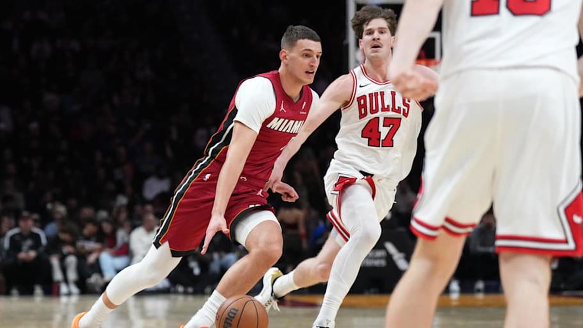  Jan 31, 2026; Miami, Florida, USA; Miami Heat forward Nikola Jovic (5) brings the ball up the court as Chicago Bulls center Lachlan Olbrich (47) follows on the play during the second half at Kaseya Center. Mandatory Credit: Jim Rassol-Imagn Images | Jim Rassol-Imagn Images 