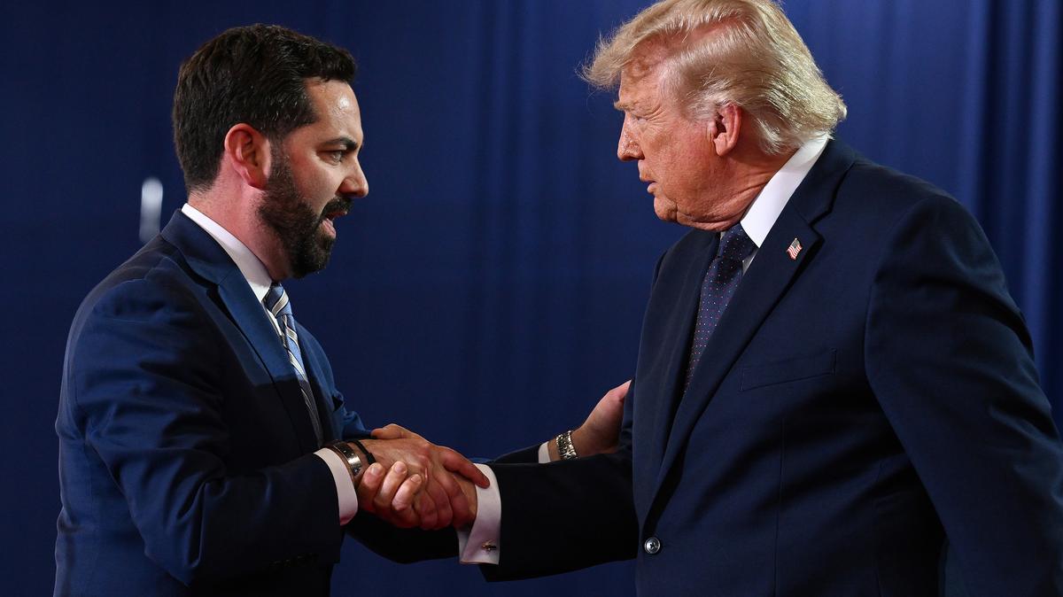 U.S. Rep. Mike Lawler, R-N.Y., shakes hands with U.S. President Donald Trump as he arrives to speak during a campaign and economic policy event in the Eugene Levy Fieldhouse at SUNY Rockland Community College on Friday, May 22, 2026, in Suffern, New York. (Roberto Schmidt/Getty Images/TNS)