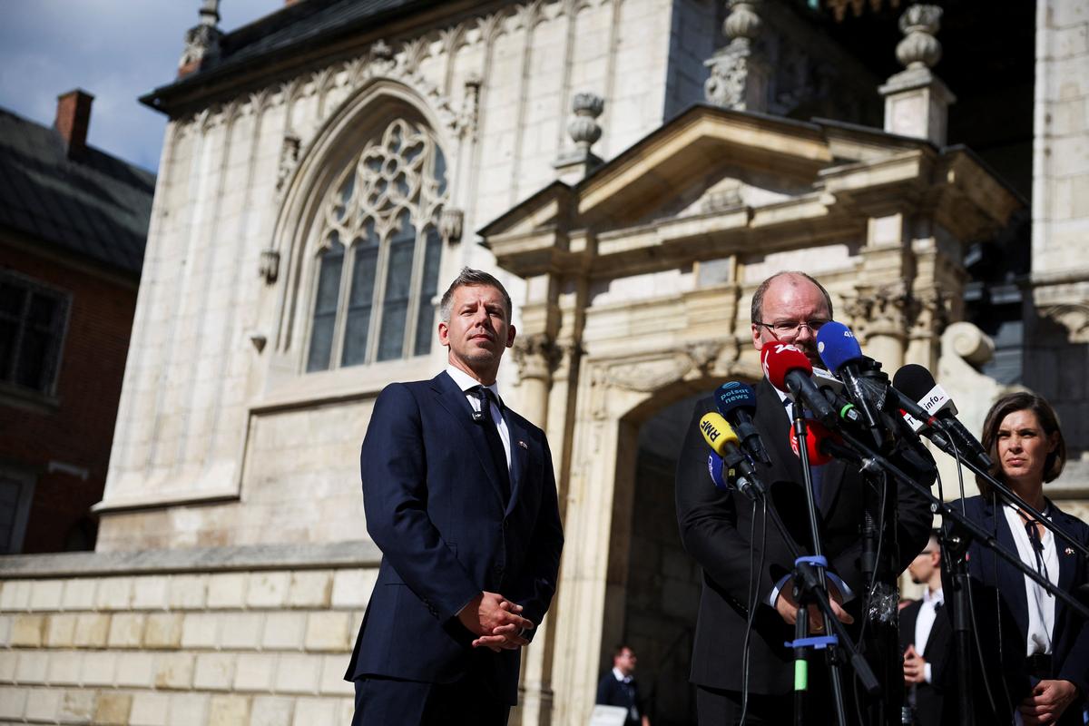 Hungary's Prime Minister Peter Magyar stands before speaking in front of the Wawel Cathedral, during his first official visit, in Krakow, Poland, May 19, 2026. REUTERS/Kacper Pempel