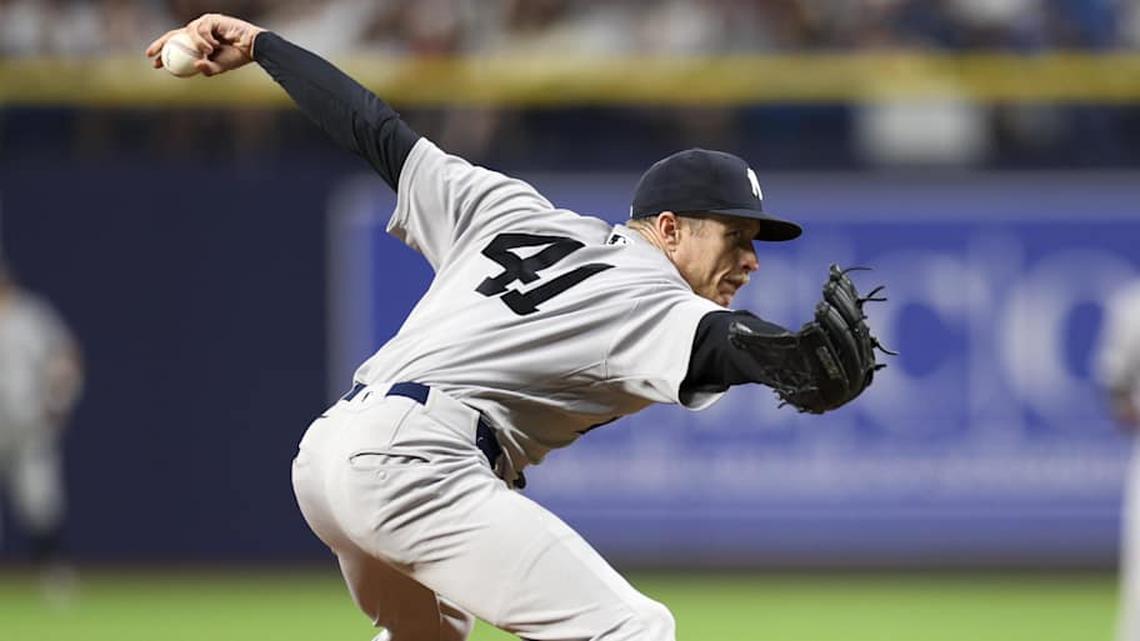  New York Yankees pitcher Tim Hill (41) throws a pitch against the Tampa Bay Rays in the ninth inning at Tropicana Field. | Nathan Ray Seebeck-Imagn Images 
