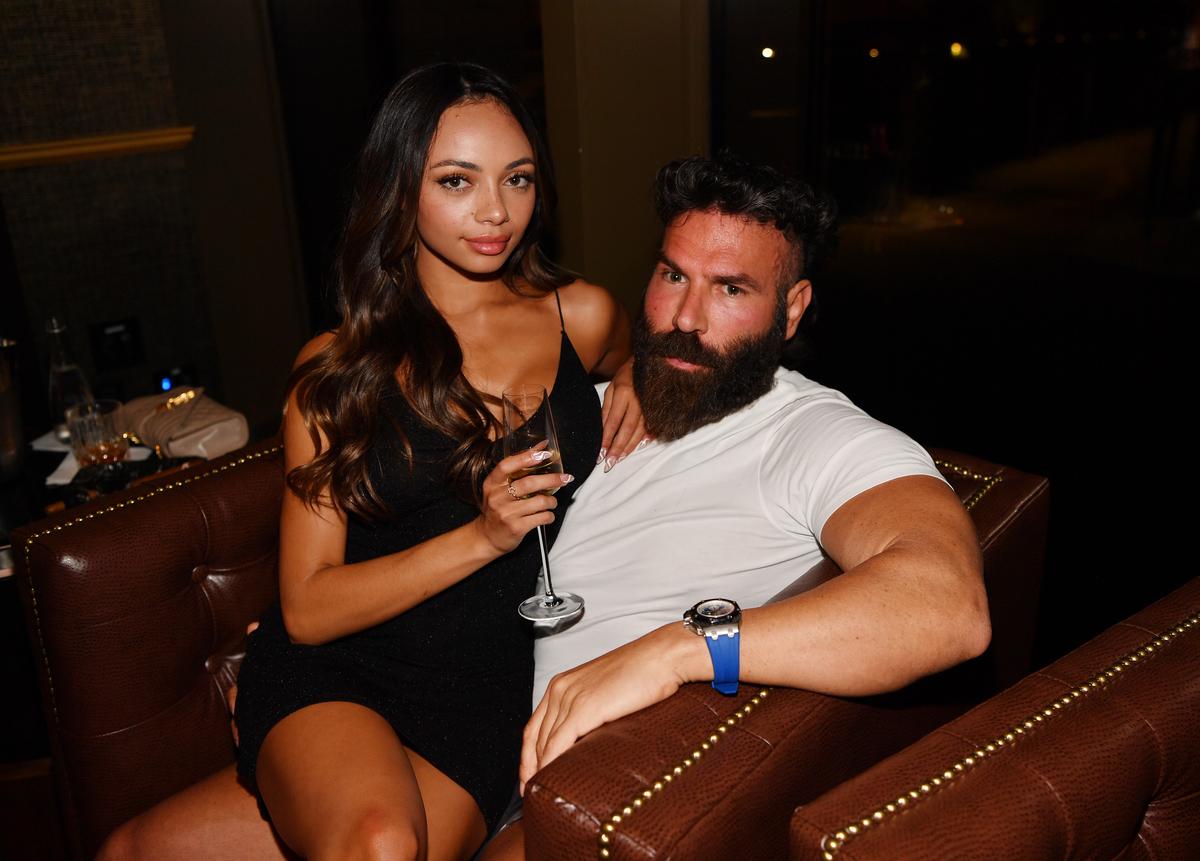  Jenny Odasz and entrepreneur Dan Bilzerian attend Eight Cigar Lounge grand opening at Resorts World Las Vegas on November 4, 2021. (Photo by Denise Truscello/Getty Images for Eight Cigar Lounge) 