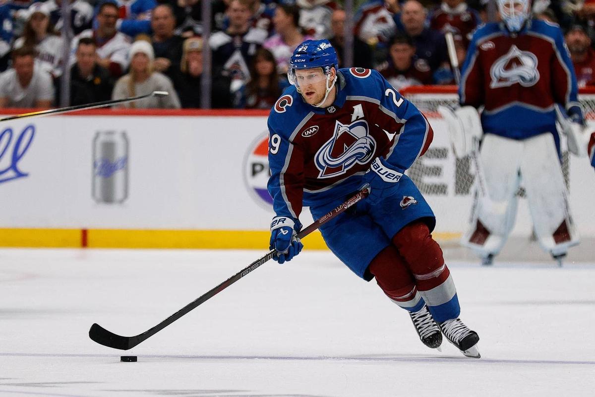  Colorado Avalanche center Nathan MacKinnon controls the puck. Isaiah J. Downing-Imagn Images