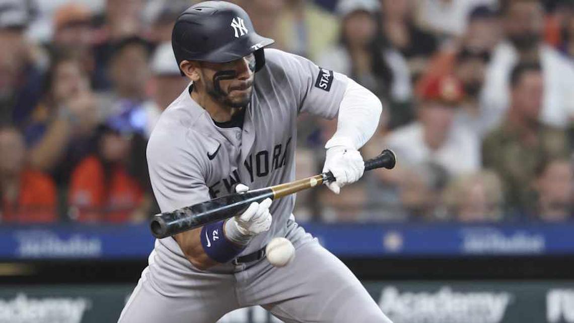  New York Yankees shortstop Jose Caballero (72) bunts for a single during the third inning against the Houston Astros at Daikin Park. | Troy Taormina-Imagn Images 