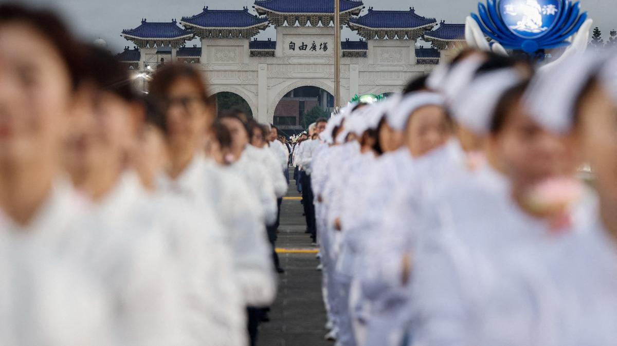 Buddhist Tzu Chi Foundation members commemorate the organization’s 60th anniversary during an annual Buddha bathing ceremony marking Buddha’s birthday, Mother’s Day and Global Tzu Chi Day at Chiang Kai-shek Memorial Hall in Taipei, Taiwan, May 10, 2026. REUTERS/Ann Wang