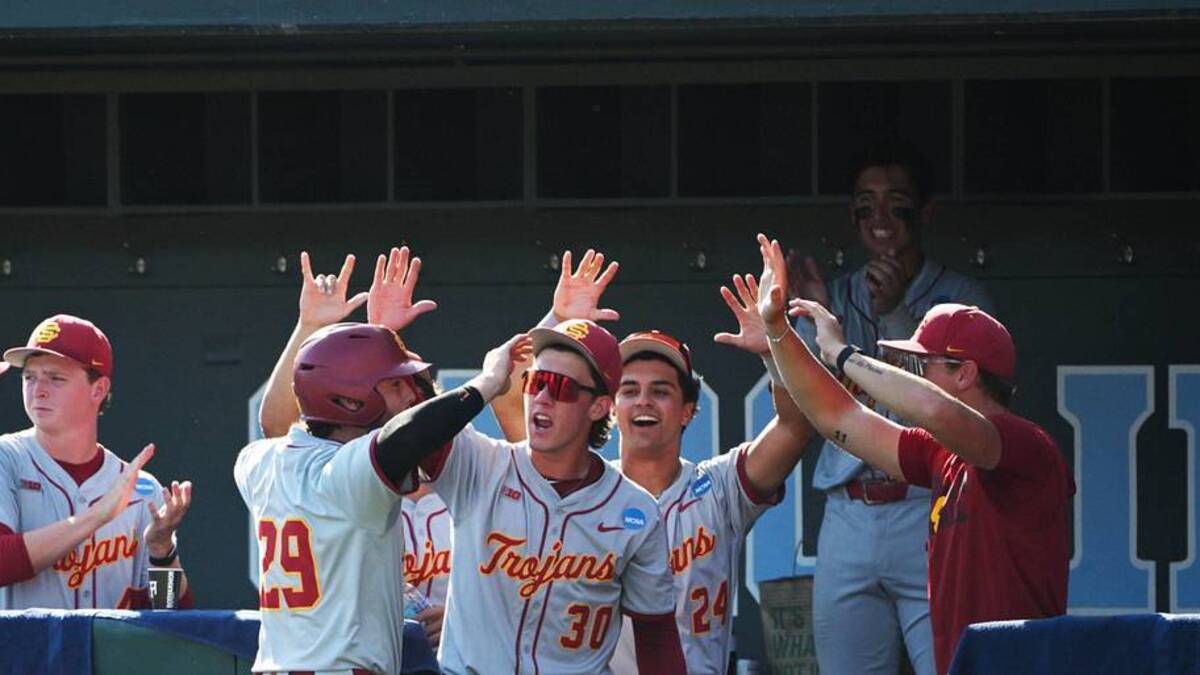  Jun 5, 2026; Chapel Hill, NC, USA; The USC Trojans celebrate USC Trojans catcher Andrew Lamb (29) during the seventh inning against the USC Trojans at Boshamer Stadium. Mandatory Credit: Zachary Taft-Imagn Images | Zachary Taft-Imagn Images 