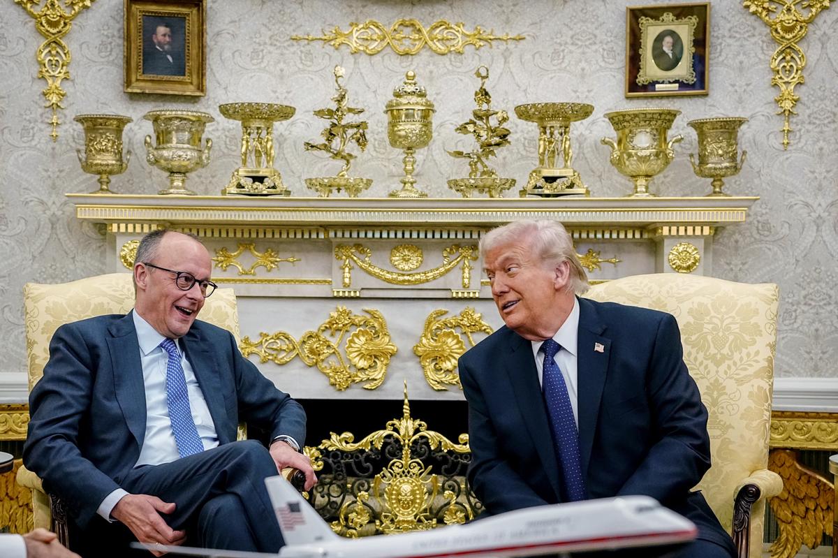 German Chancellor Friedrich Merz, left, speaks with U.S. President Donald Trump at the White House on March 3. 